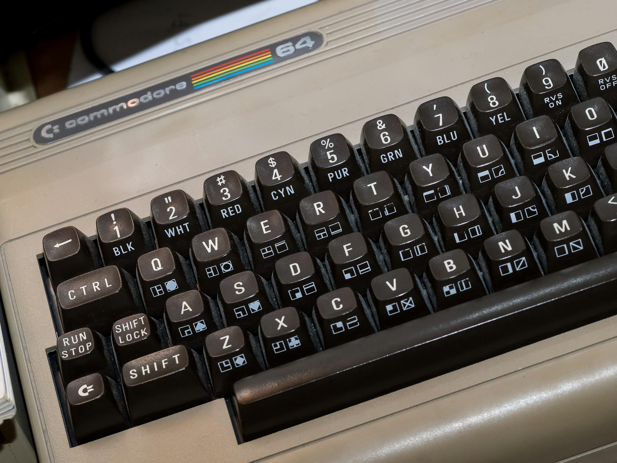Home Detailed view of the classic Commodore 64 keyboard showcasing its vintage keys and design.