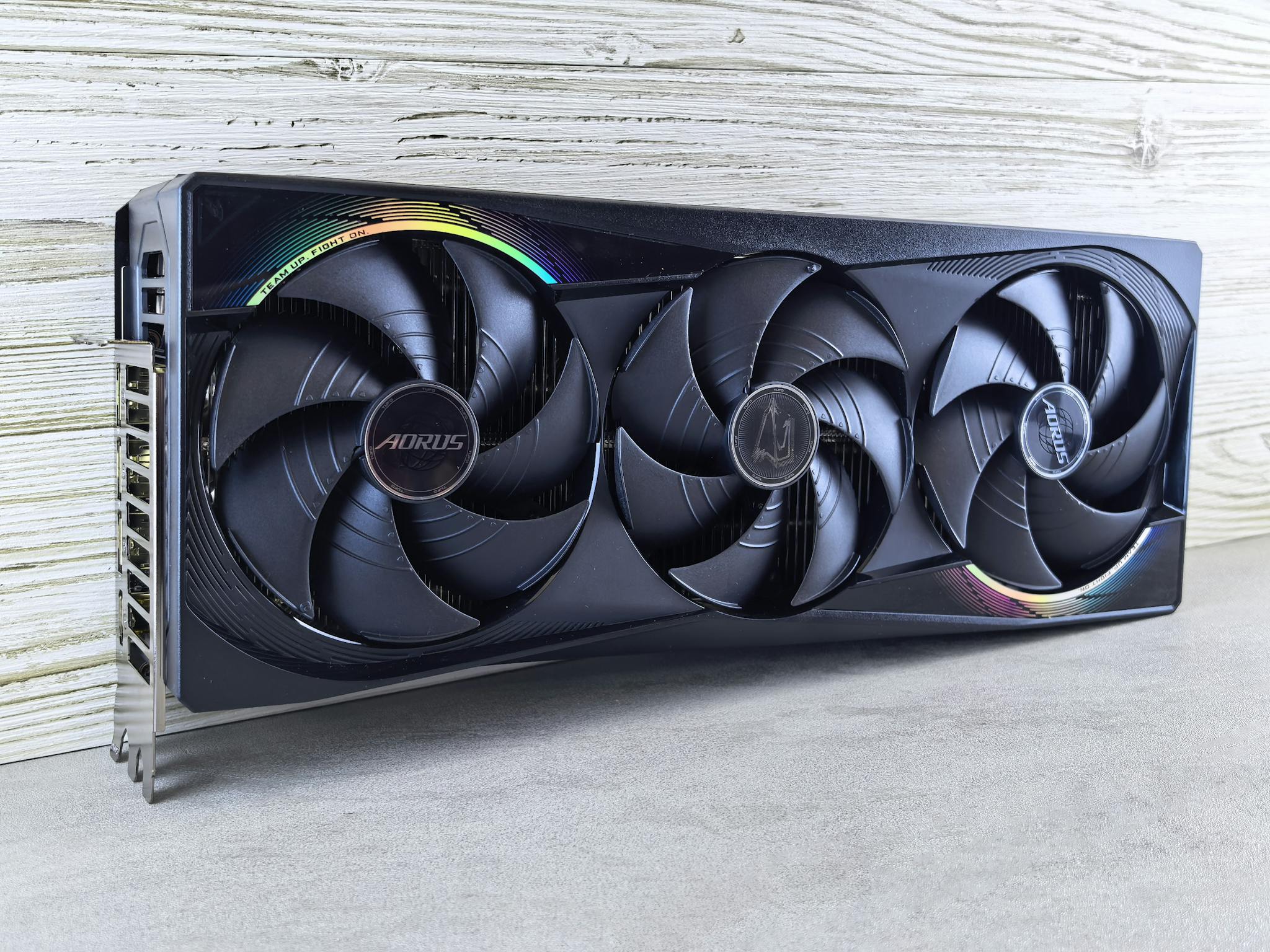 Home Triple fan GPU with RGB lighting, ideal for gaming setups and high-performance computing.
